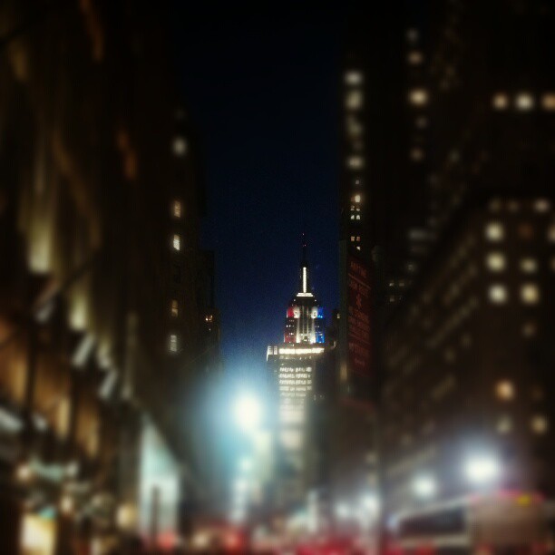 top ten lists: new york city Empire State Building shows off in red white and blue. top ten lists: new york city